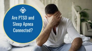 A man is frustrated by sleep apnea. The caption says: Are PTSD and sleep apnea connected?